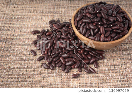 Red dry kidney beans. Uncooked bean pile, raw legume or red beans, rajma 136997059