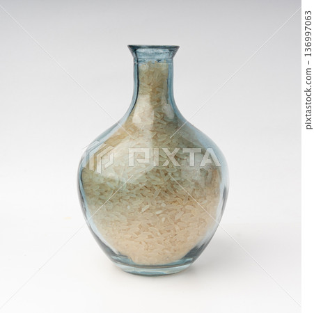 White parboiled rice grains. Dry uncooked ponni rice, small organic basmati White parboiled rice grains. Dry uncooked ponni rice, small organic basmati 136997063