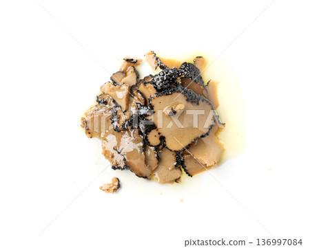 Truffle Slices Isolated, Tuber Melanosporum Mushroom Pieces in Oil, Canned Black Truffle 136997084