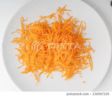Fresh Finely Grated Carrots Isolated 136997195