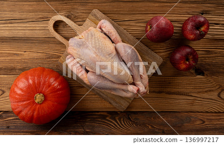 Helmeted guinea fowl raw meat Helmeted guinea fowl raw meat 136997217