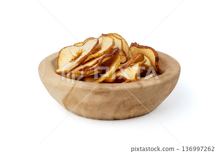 Dry apple slices isolated, dried apple chips, healthy fruit snack 136997262