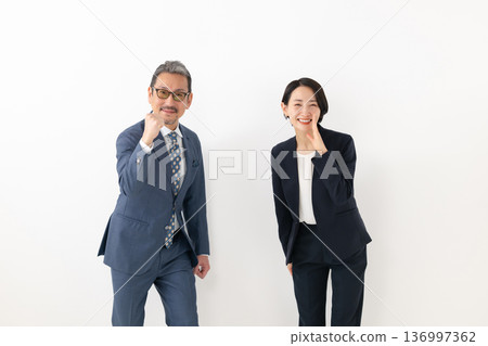Men and women in suit Men and women in suit 136997362