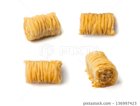 Rolled Baklava Isolated, Ramadan Dessert Roll on Restaurant Plate, Eastern Sweet Pastries Rolled Baklava Isolated, Ramadan Dessert Roll on Restaurant Plate, Eastern Sweet Pastries 136997423