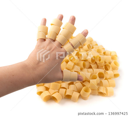 Raw Calamarata Big Pasta Isolated, Homemade Dry Macaroni, Italian Raw Round Noodle 136997425