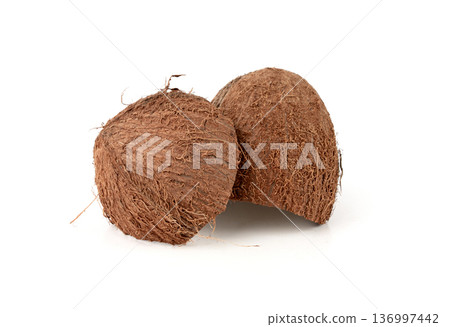 Coconut pieces, broken coco nut isolated, fresh tropical palm fruit slices, open cracked coconut Coconut pieces, broken coco nut isolated, fresh tropical palm fruit slices, open cracked coconut 136997442