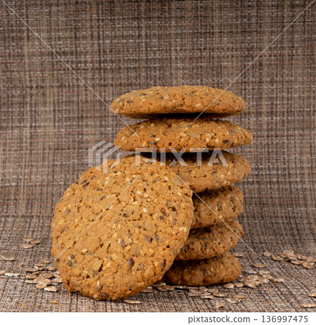 Whole and broken oatmeal cookies, cereal biscuits, fitness bakery 136997475