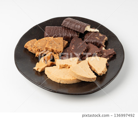 Protein cookie isolated, broken round energy snack with peanuts, chicory fibre 136997492