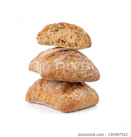Brown rye bun, square gluten free bread, whole grain healthy breakfast bread Brown rye bun, square gluten free bread, whole grain healthy breakfast bread 136997502