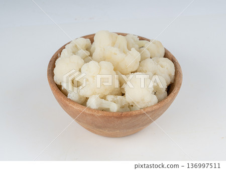Steamed cauliflower pieces close up Steamed cauliflower pieces close up 136997511