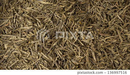 Green tea leaves macro textured background 136997516