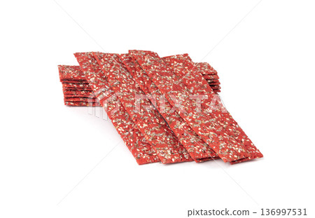 Beetroot crackers, thin rusk beet root bread, red diet multigrain crispbread, various seeds 136997531
