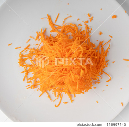 Fresh Finely Grated Carrots Isolated 136997540