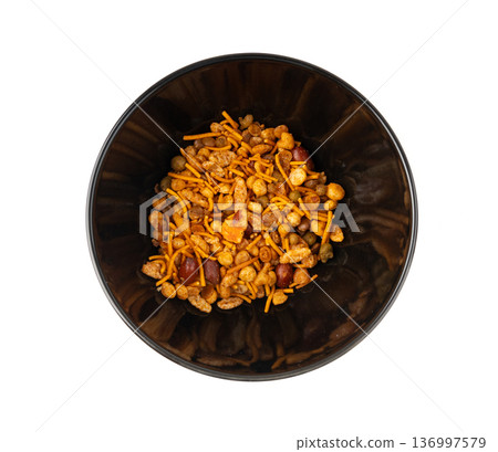 Navrattan namkeen mixture. Indian nimko snack, spicy and sweet farsaan Navrattan namkeen mixture. Indian nimko snack, spicy and sweet farsaan 136997579