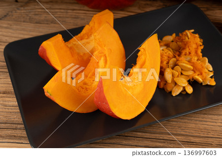 Red kuri squash or hokkaido pumpkin Red kuri squash or hokkaido pumpkin 136997603
