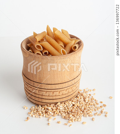 Raw Brown Pasta, Wholegrain Penne, Dry Whole Grain Noodle, Raw Spelt Macaroni, Healthy Italy Food 136997722
