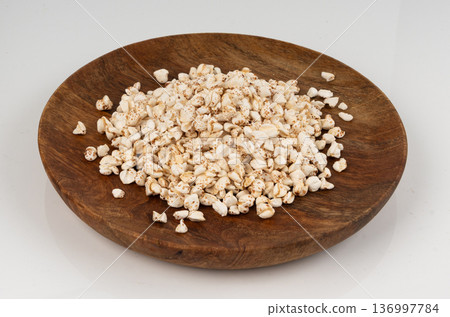 Puffed buckwheat isolated, crispy cereal breakfast, ancient healthy food Puffed buckwheat isolated, crispy cereal breakfast, ancient healthy food 136997784