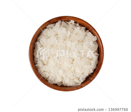 Raw flattened rice isolated. Dry rice flakes or poha, Indian breakfast food 136997788