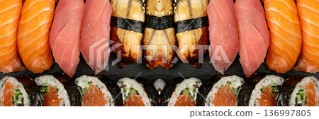 Set of Various Japanese Sushi Food on Dark Sate Plate Closeup. Nigiri and Nori Maki Sushi Rolls 136997805