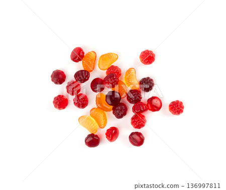Fruit gummy candy pile isolated, vegan chewing marmalade pills, jelly gumdrops heap Fruit gummy candy pile isolated, vegan chewing marmalade pills, jelly gumdrops heap 136997811