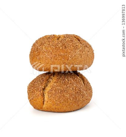 Brown rye bun isolated, round bread Brown rye bun isolated, round bread 136997813