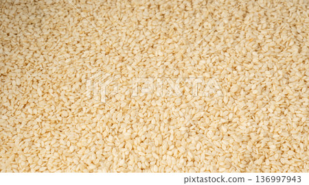 Sesame seeds pile textured background Sesame seeds pile textured background 136997943