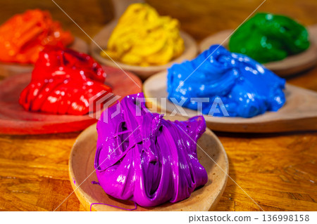 Purple Ink on wood paddle 136998158