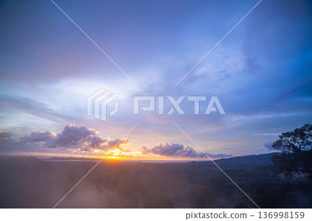 Aerial view of Soft Veil of Mist Beneath a Painted Sky 136998159