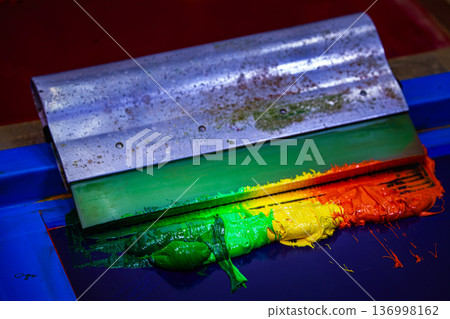 Viscous Ink Blending Dripping from Wooden Handle 136998162