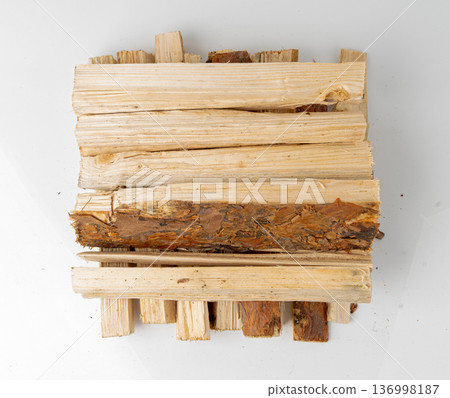 Firewood pile isolated, cut logs stack 136998187