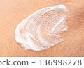Applying skin cream close up. Body care lotion smear on dry skin, skincare moisturizer cosmetics 136998278