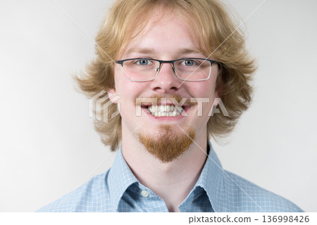Funny looking young adult guy Funny looking young adult guy 136998426