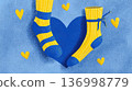 Illustrative card for World Down Syndrome Day on March 21 featuring blue and yellow unpaired socks and hearts, symbolizing the extra chromosome that causes the syndrome 136998779