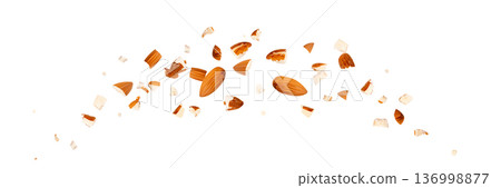 Crushed almonds falling isolated, flying nut pieces, levitate scattered almond seeds 136998877