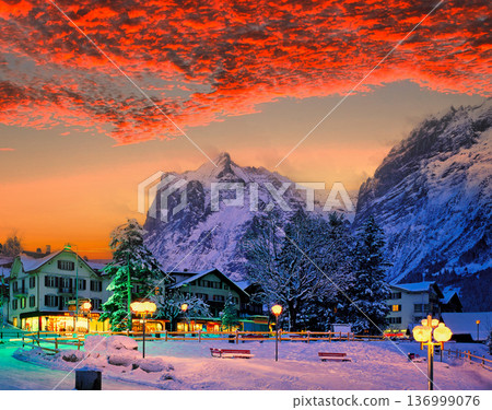 A beautiful sunset in Grindelwald during the dead of winter A beautiful sunset in Grindelwald during the dead of winter 136999076