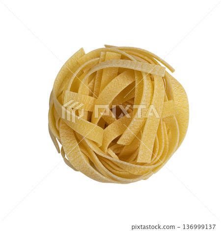 uncooked tagliatelle pasta uncooked tagliatelle pasta 136999137