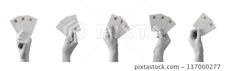 Hands holding plastic bank cards isolated background. Payment finance gesture showing credit debit cards. Shopping transaction business concept.. 137000277