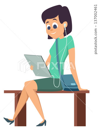 Girl watch video on tablet with earphones. Social media content user 137002461