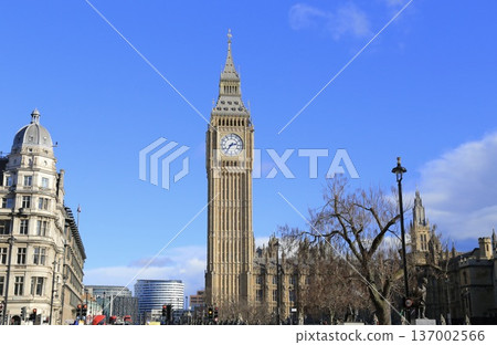 Big Ben, the symbol of London against the blue sky Big Ben, the symbol of London against the blue sky 137002566