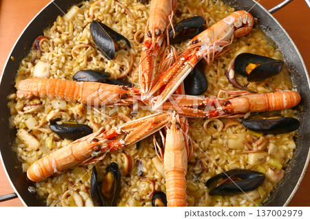 Mediterranean Rice with Prawns or Langoustines Mediterranean Rice with Prawns or Langoustines 137002979