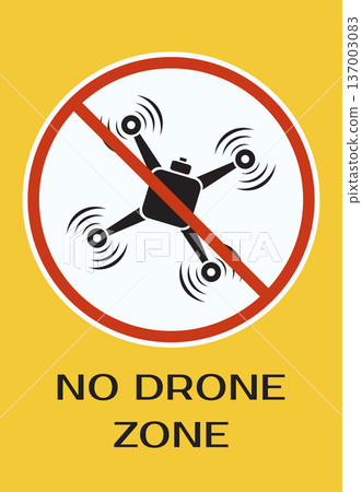 Yellow warning sign with drone prohibition symbol and bold text No Drone Zone for safety and regulation awareness Yellow warning sign with drone prohibition symbol and bold text No Drone Zone for safety and regulation awareness 137003083
