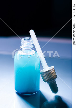 Pipette with regenerating Copper Peptides serum for beautiful healthy skin and moisturizing anti aging facial essence 137003167