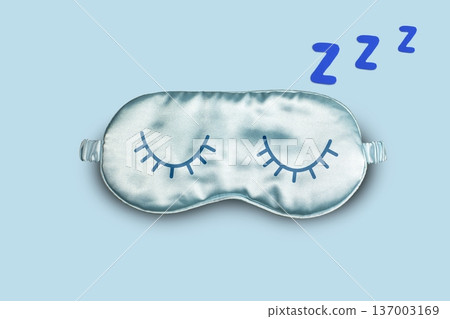 World Sleep day, Sleeping mask on light blue background and letters Z symbolizing deep sleep and dreaming with copy space World Sleep day, Sleeping mask on light blue background and letters Z symbolizing deep sleep and dreaming with copy space 137003169