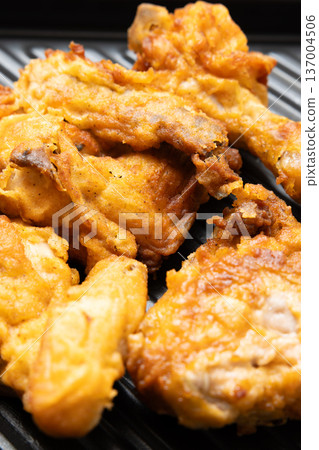Reheat fried chicken in a toaster oven Reheat fried chicken in a toaster oven 137004506