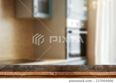 Wooden table top with blurred kitchen interior background 137004806