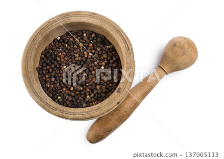 Black pepper corn into mortar and pestle Black pepper corn into mortar and pestle 137005113