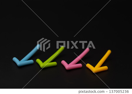 Stock photo of a black background and a downward arrow - Down image 137005236