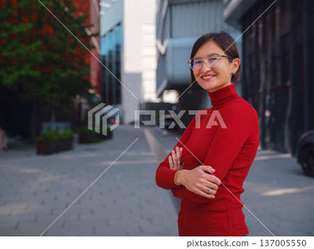 Woman in glasses stands in center of Frankfurt, Woman in glasses stands in center of Frankfurt, 137005550