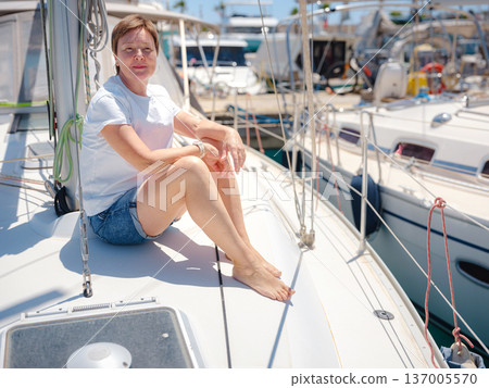Adult Woman Enjoying Sunny Day On Yacht Finike Marina Turkey Adult Woman Enjoying Sunny Day On Yacht Finike Marina Turkey 137005570