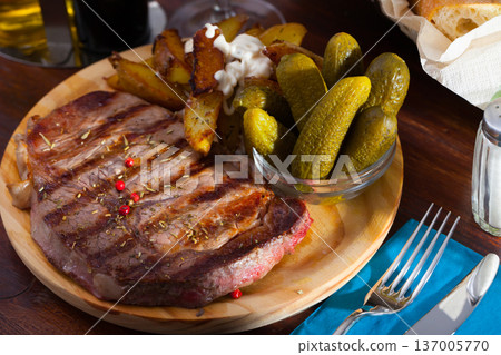 Grilled beef with fried potatoes Grilled beef with fried potatoes 137005770